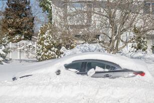 CENTEREACH, NY - JANUARY 30: A car sits buried in snow after a blizzard hit the Northeast on January 30, 2022 in Centereach, New York. A powerful nor’easter brought blinding blizzard conditions with high winds causing some power outages to the Mid-Atlantic and New England coast. (Photo by Andrew Theodorakis/Getty Images)