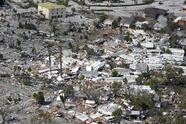 Damaged homes and debris are shown in the aftermath of Hurricane Ian, Thursday, Sept. 29, 2022, in Fort Myers, Fla. (AP Photo/Wilfredo Lee)